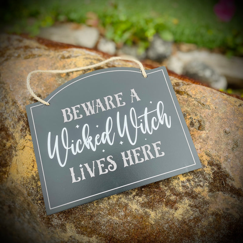 Beware A Wicked Witch Lives Here Hanging sign